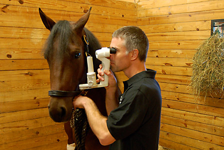 Dr. Nick Cassotis performing a slit-lamp examination